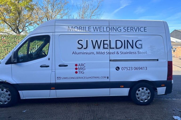White van with "SJ WELDING" and services listed on the side.